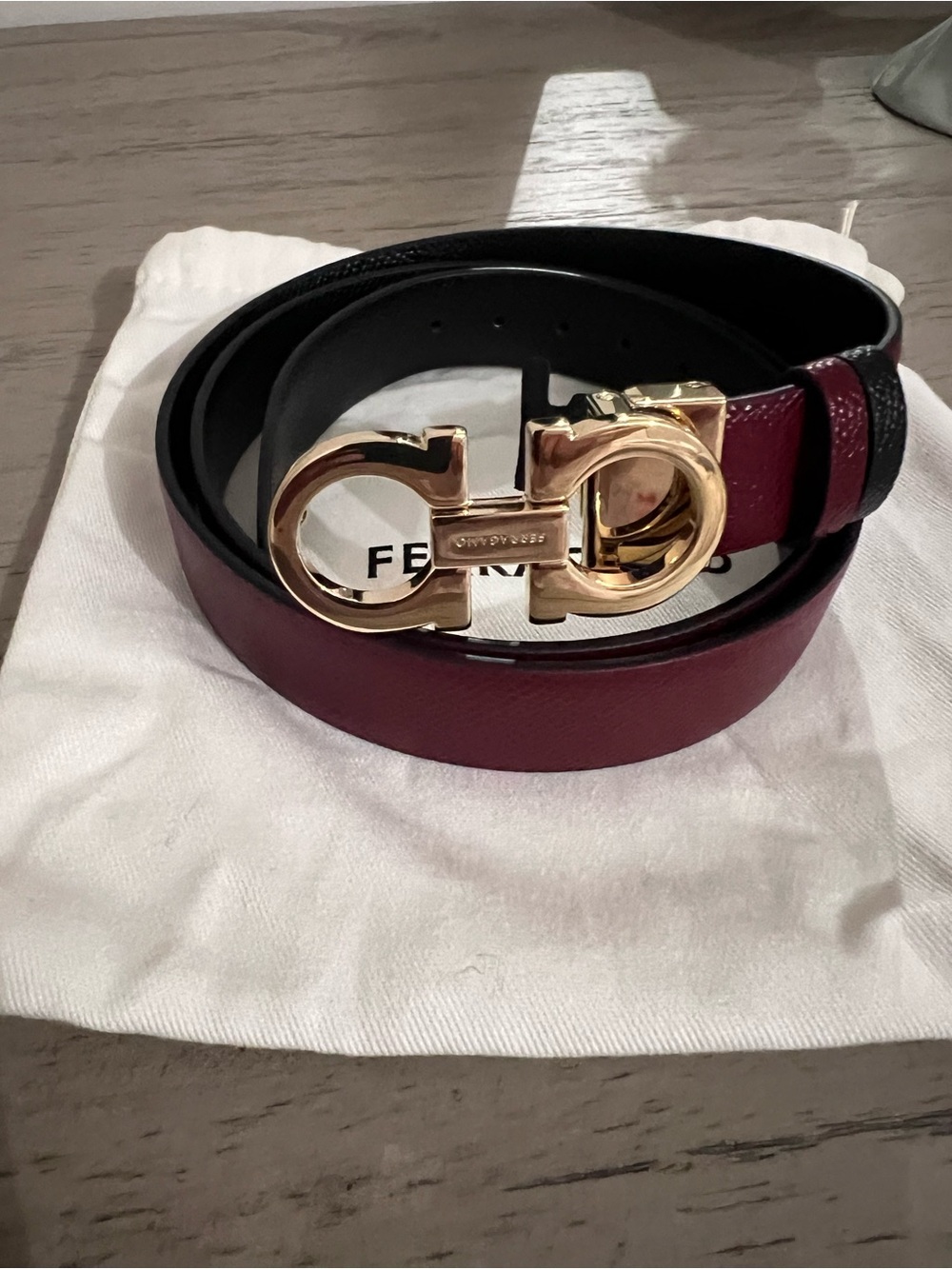 Salvatore Ferragamo Burgundy and Black Leather Belt with Gold Gancini Buckle